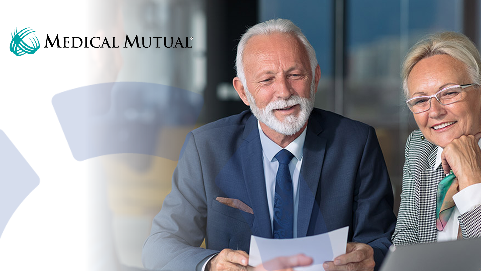 business owners reviewing health plan options with a consultant