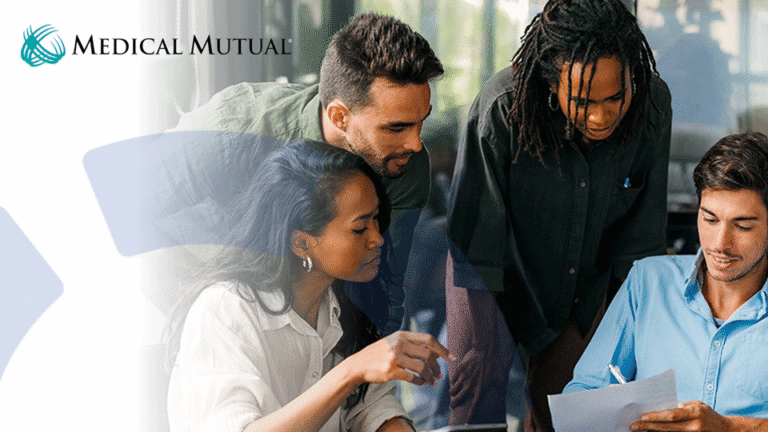 Group of business professionals reviewing a benefits package for their business